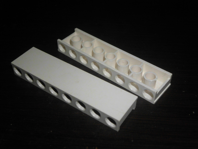 Tile, Modified 2 x 8 x 5/6 with Channel and Stud Holes on Side