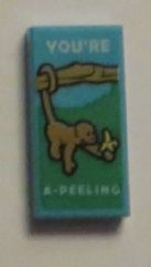 Tile 1 x 2 with Monkey with Banana and 'YOU'RE A-PEELING' Pattern