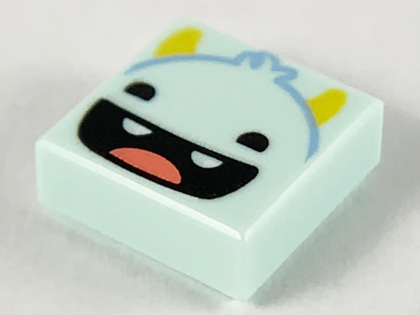 Tile 1 x 1 with Smiling Monster Face, Yellow Horns, Black Eyes, Open Mouth, 2 Teeth and Red Tongue Pattern