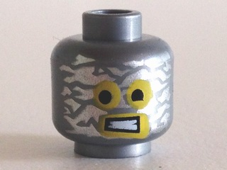 Minifigure, Head Alien with Robot Yellow Eyes and Mouth and Aluminum Foil Splotches Pattern