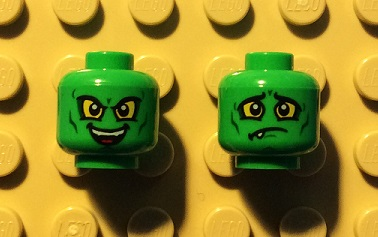 Minifigure, Head Dual Sided Alien with Yellow Eyes, Wicked Smile / Downturned Mouth with 1 Fang Pattern (Green Goblin)