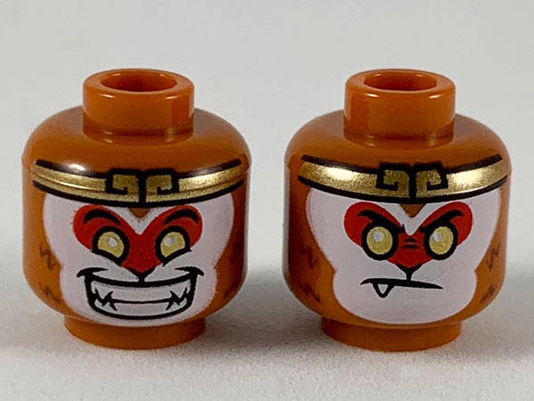 Minifigure, Head Dual Sided Gold Headband and Eyes, White Face with Red Around Eyes, Wide Smile / Neutral with One Sharp Tooth Pattern