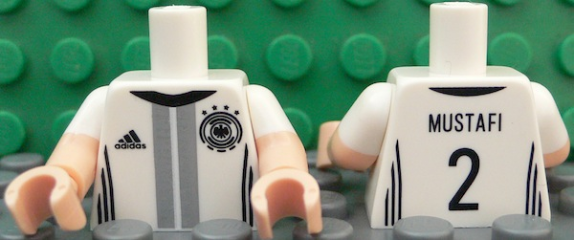 Torso Soccer Shirt with Adidas Logo, 4 Stars and Eagle Front, 'MUSTAFI 2' Back Pattern / Light Nougat Arms with Molded White Short Sleeves Pattern / Light Nougat Hands