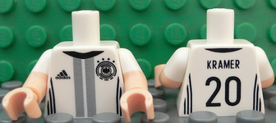 Torso Soccer Shirt with Adidas Logo, 4 Stars and Eagle Front, 'KRAMER 20' Back Pattern / Light Nougat Arms with Molded White Short Sleeves Pattern / Light Nougat Hands