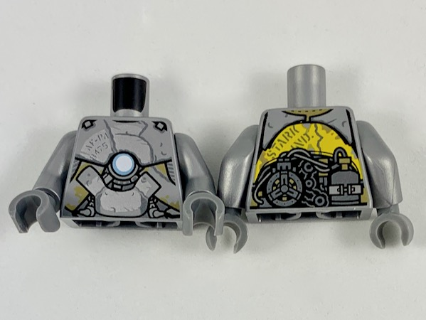 Torso Clunky Asymmetrical Silver Armor, Metallic Light Blue Circle on Chest, Exposed Gear Pattern / Flat Silver Arms / Dark Bluish Gray Hands